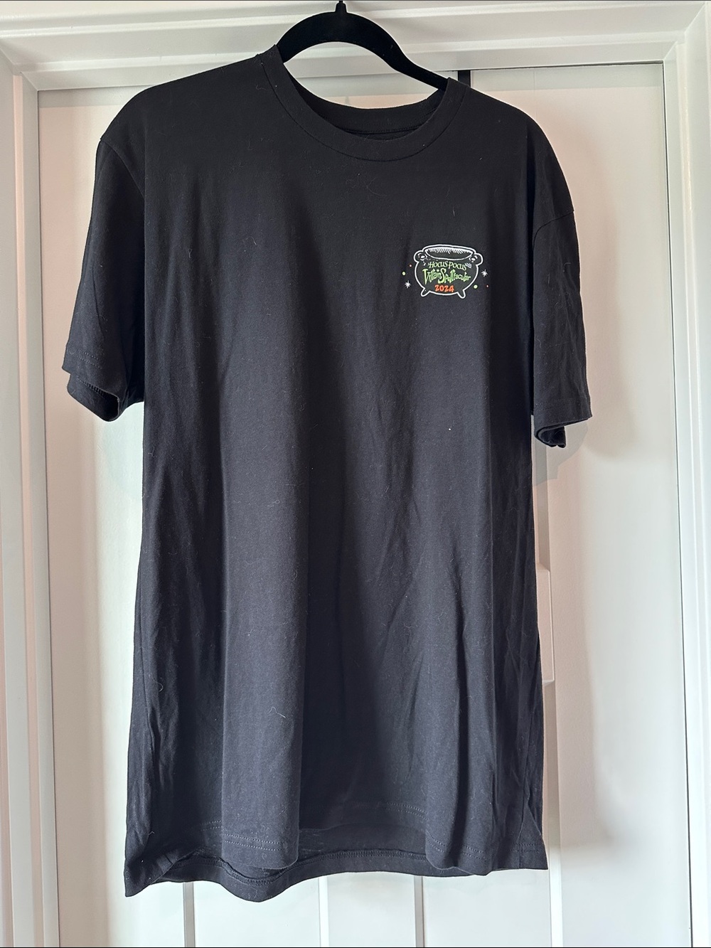 Disney Black Short Sleeve Tee with Small Green Chest Graphic